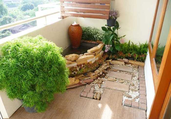 Thiết kế tiểu cảnh ban công kết hợp nước và cây xanh 1